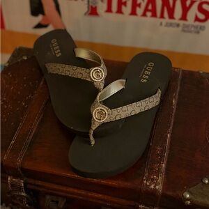 Guess Black and Tan Logo Flip Flops Sold Out Online